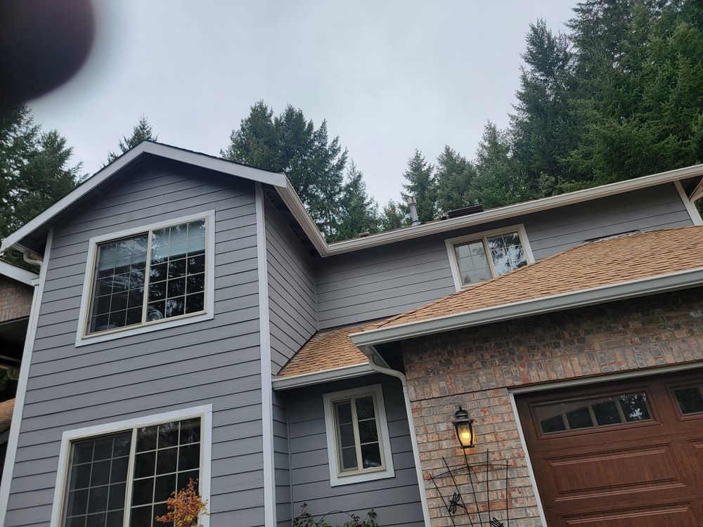 Remodeled exterior with clean gutter lines